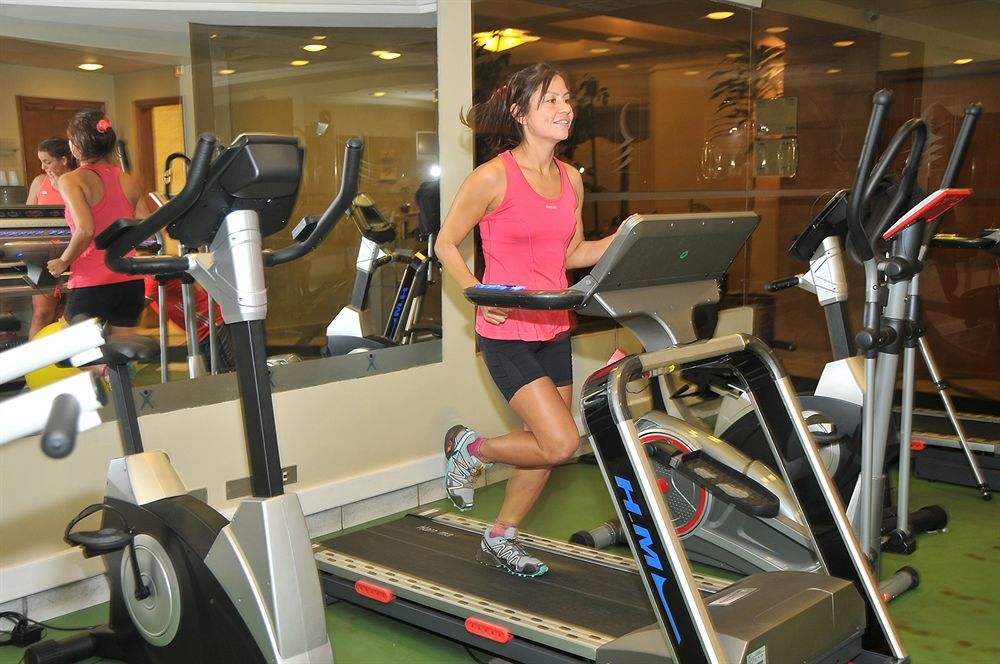 Hotel Regal Pacific Santiago Exterior photo A woman on a treadmill